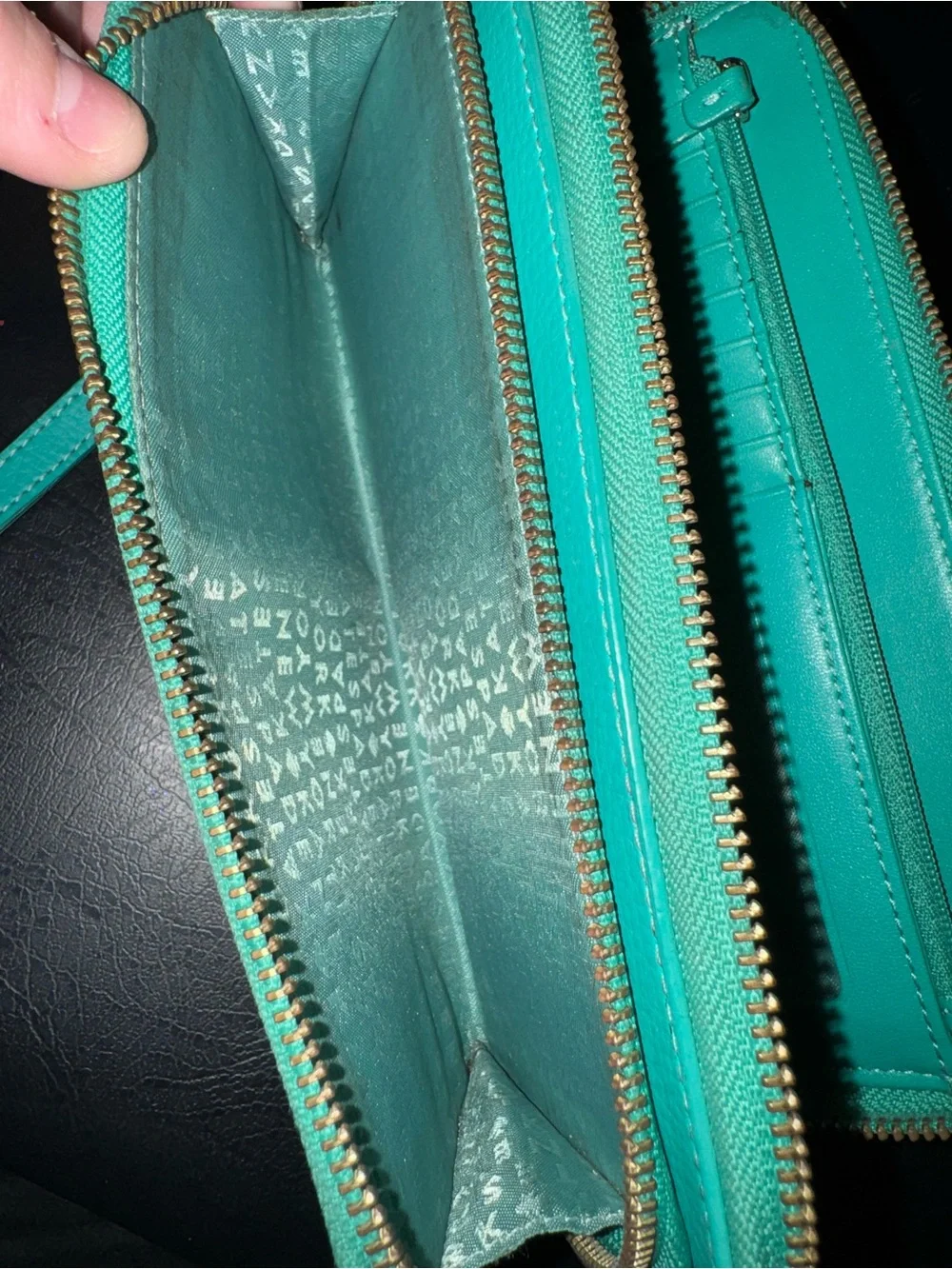 kate spade turquoise zip-around studded wallet